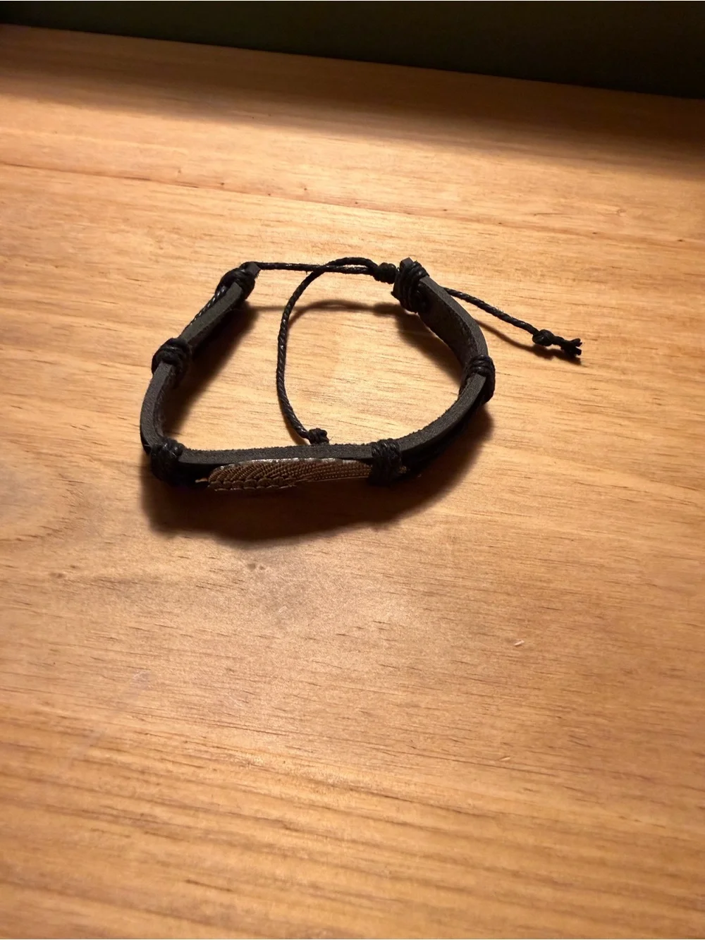 Men's Black Leather Braided Bracelet with Silver feather Accent